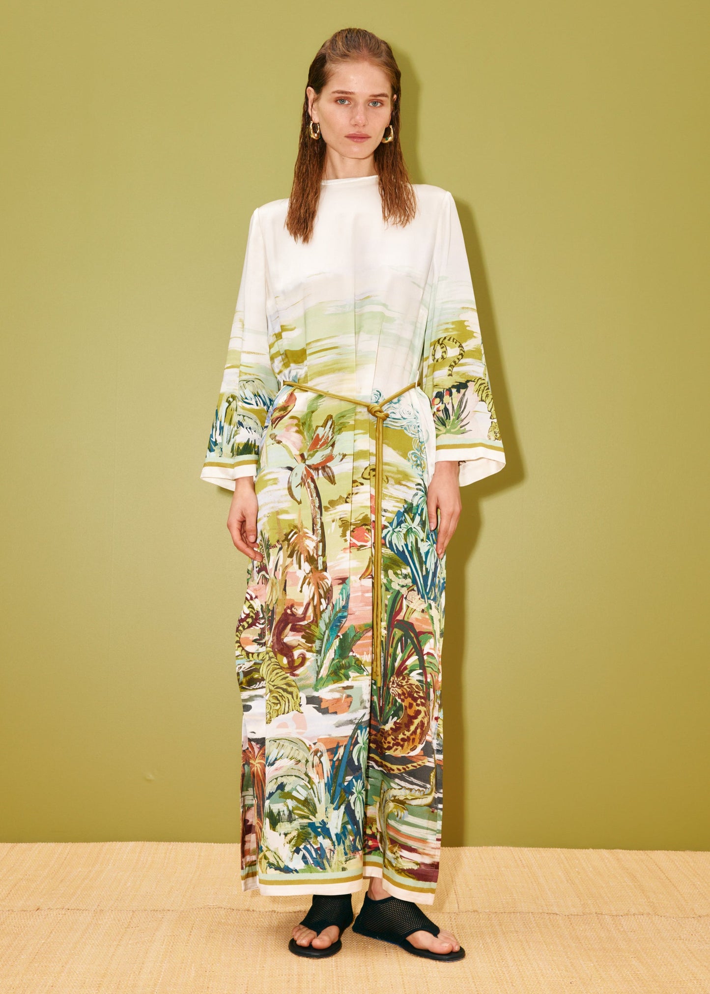 person wearing alemais womens Jungle Boogie Silk Midi Dress