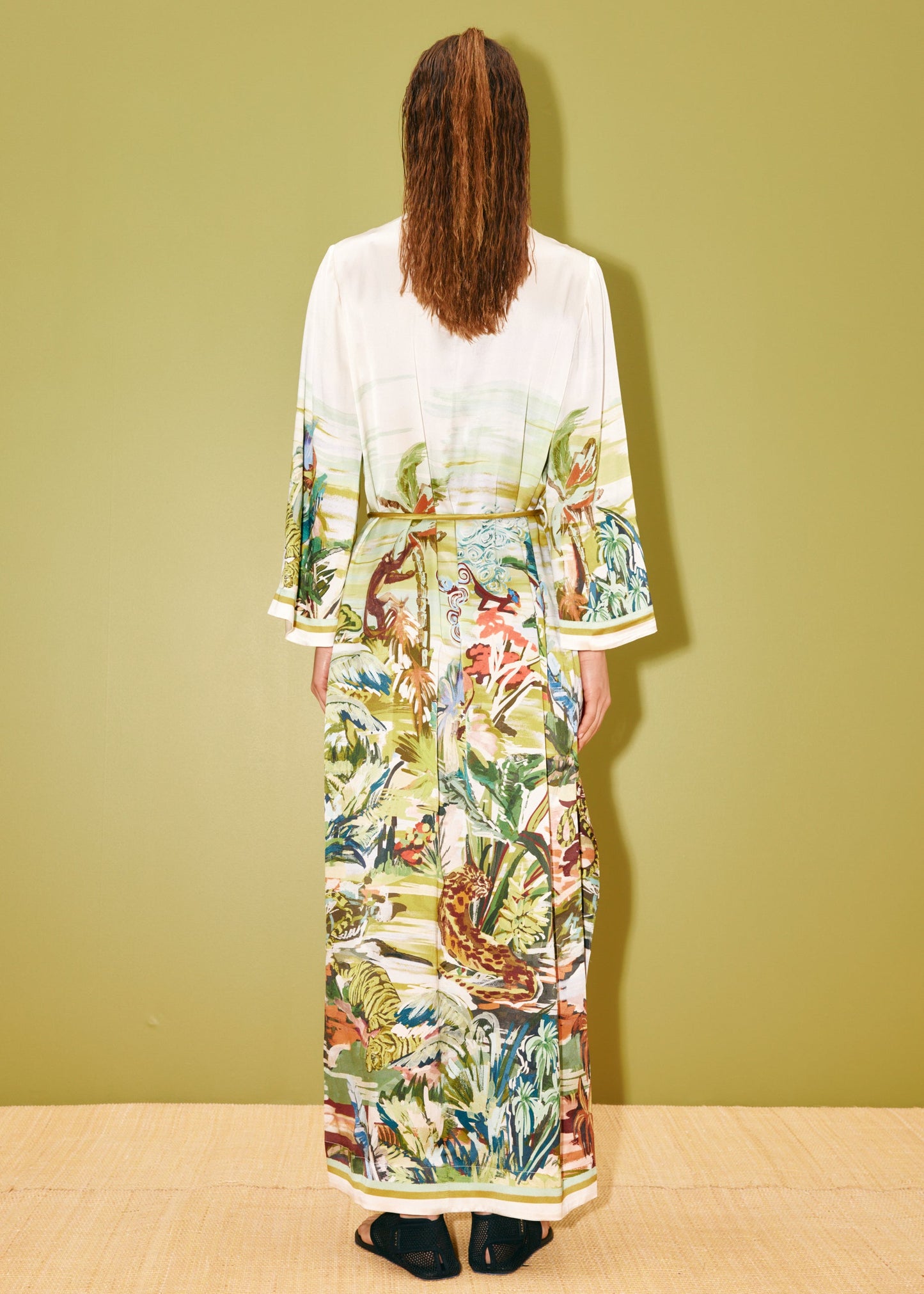 person wearing alemais womens Jungle Boogie Silk Midi Dress