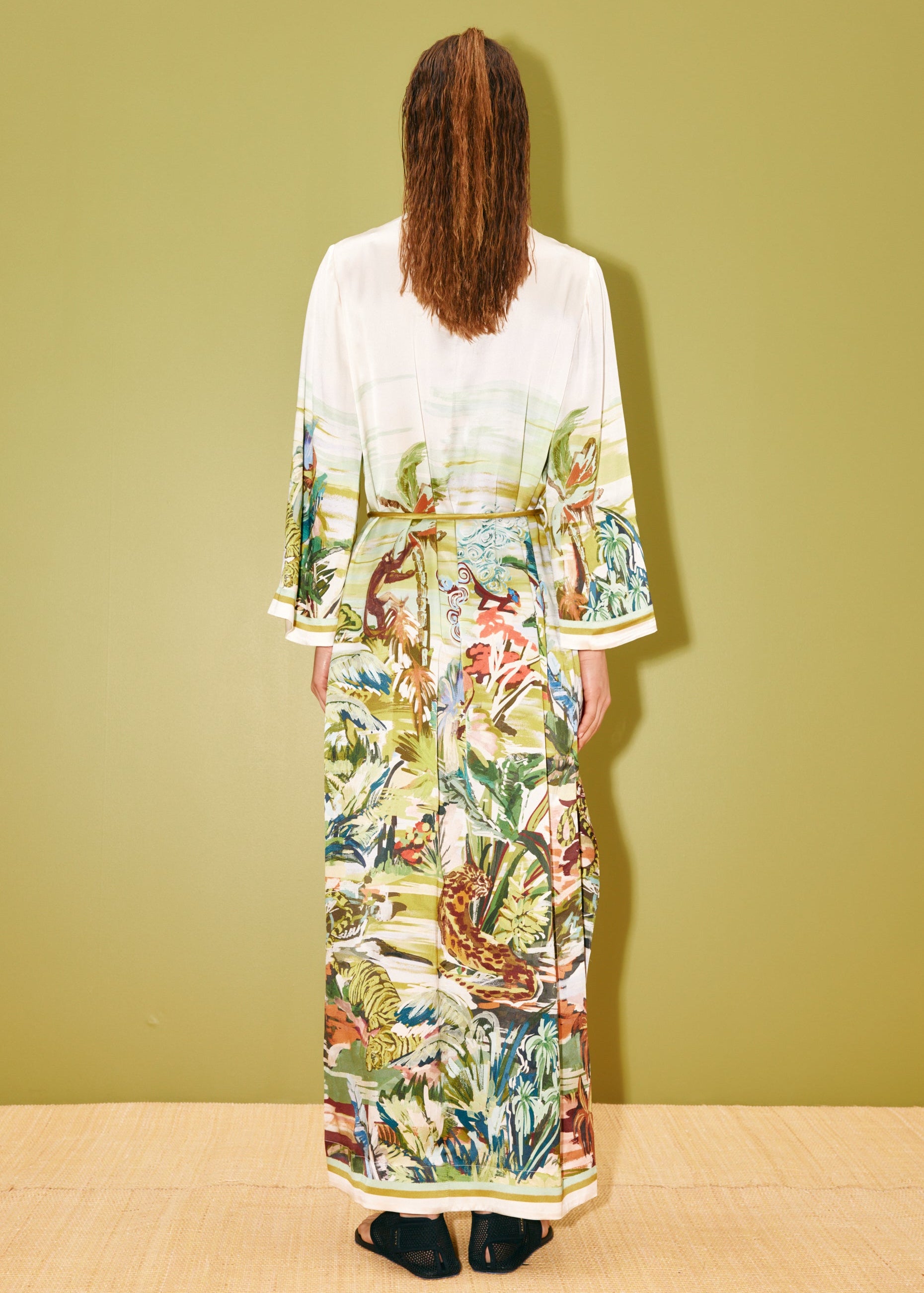 person wearing alemais womens Jungle Boogie Silk Midi Dress