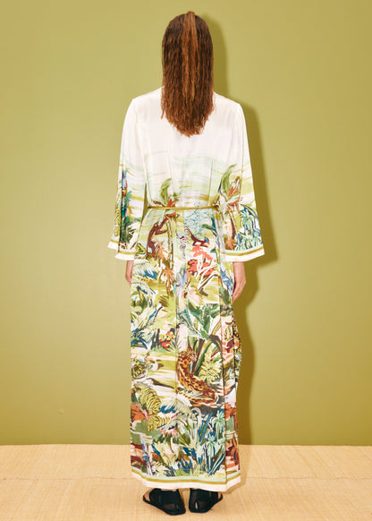 person wearing alemais womens Jungle Boogie Silk Midi Dress