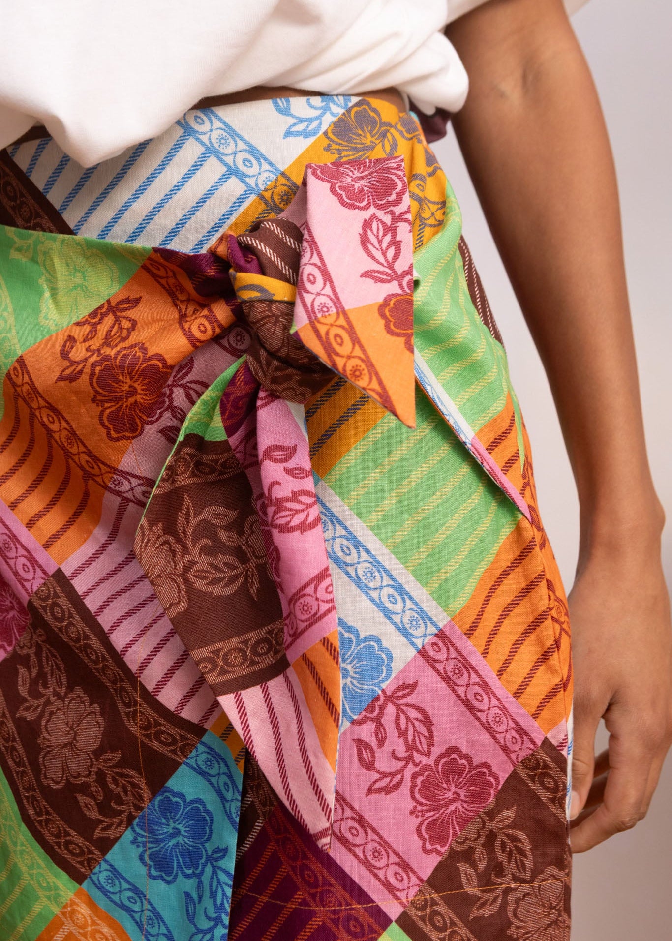 person wearing alemais womens Kaleidoscope Sarong Skirt multicolor linen