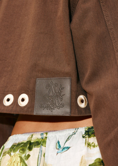 person wearing alemais womens Tobe Denim Jacket chocolate brown