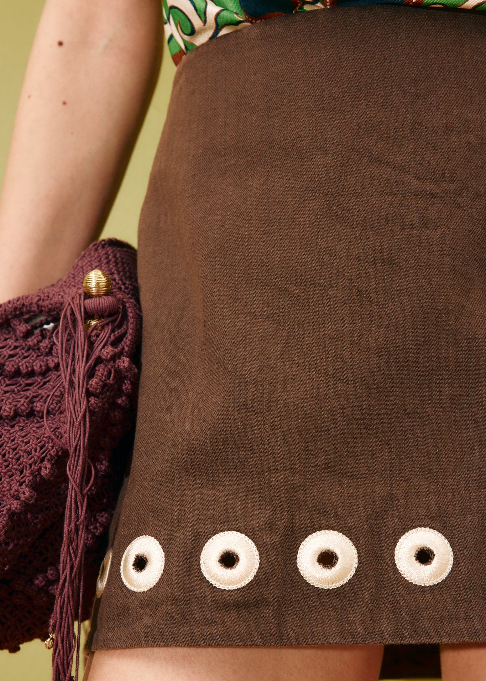 person wearing alemais womens Tobe Denim Skirt chocolate