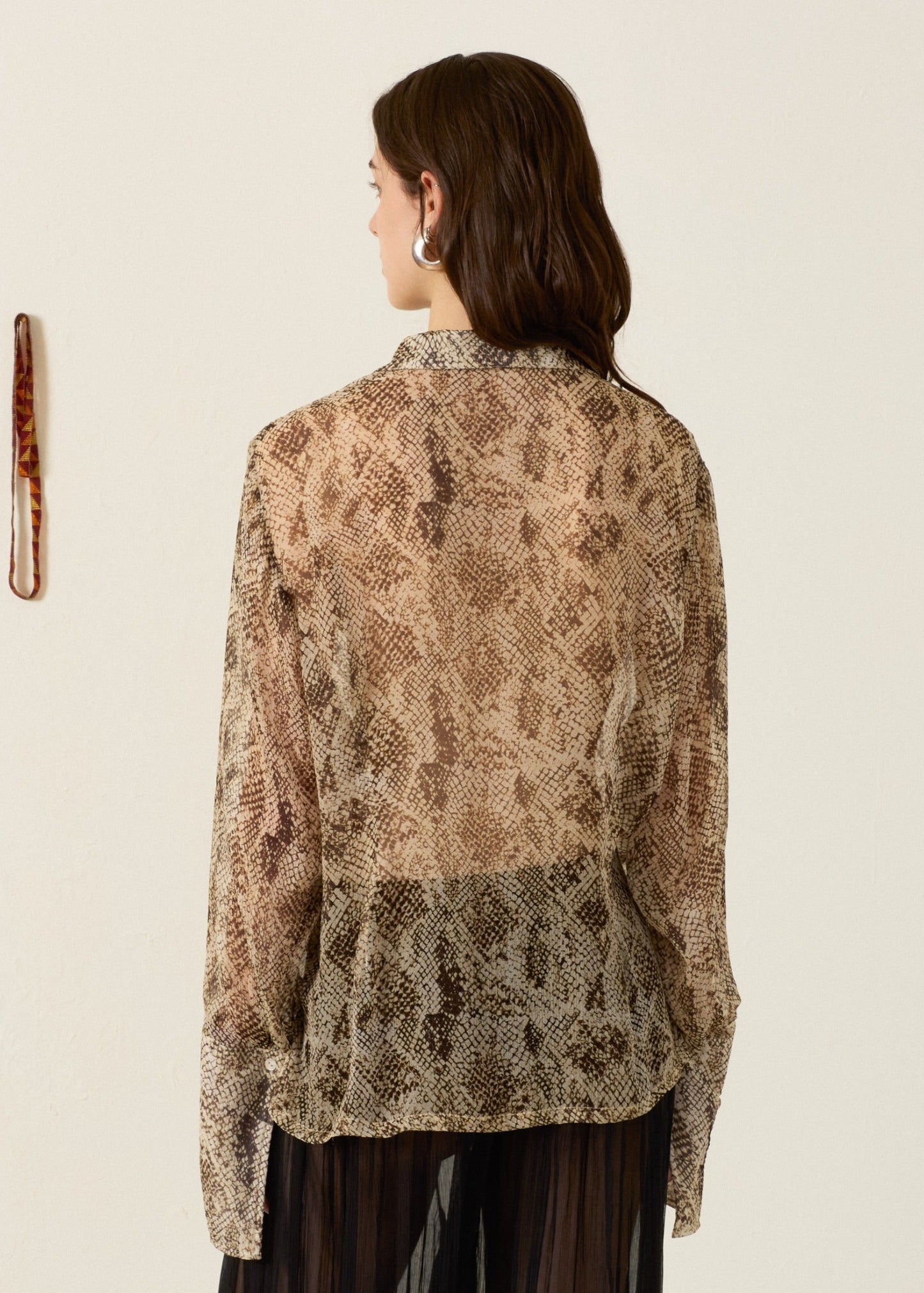 person wearing alix of bohemia Dana Lemon Snakeskin Shirt