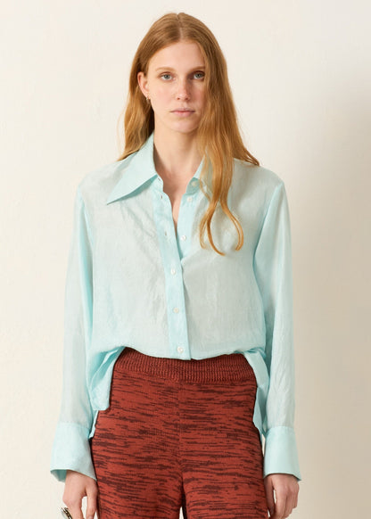 person wearing alix of bohemia Dana Morning Dew Silk Shirt in turquoise