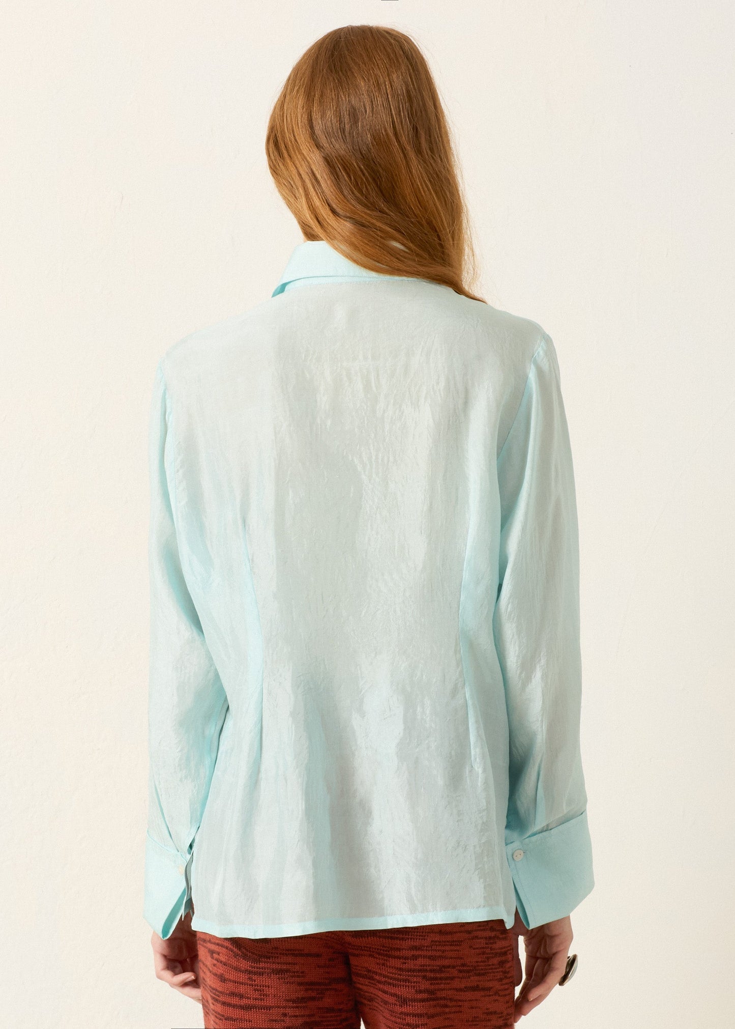person wearing alix of bohemia Dana Morning Dew Silk Shirt in turquoise