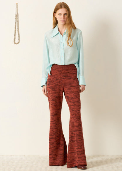 person wearing alix of bohemia Dana Morning Dew Silk Shirt in turquoise