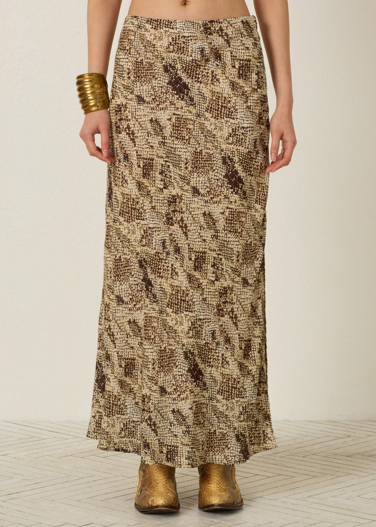 person wearing alix of bohemia Lyra Lemon Snakeskin Skirt