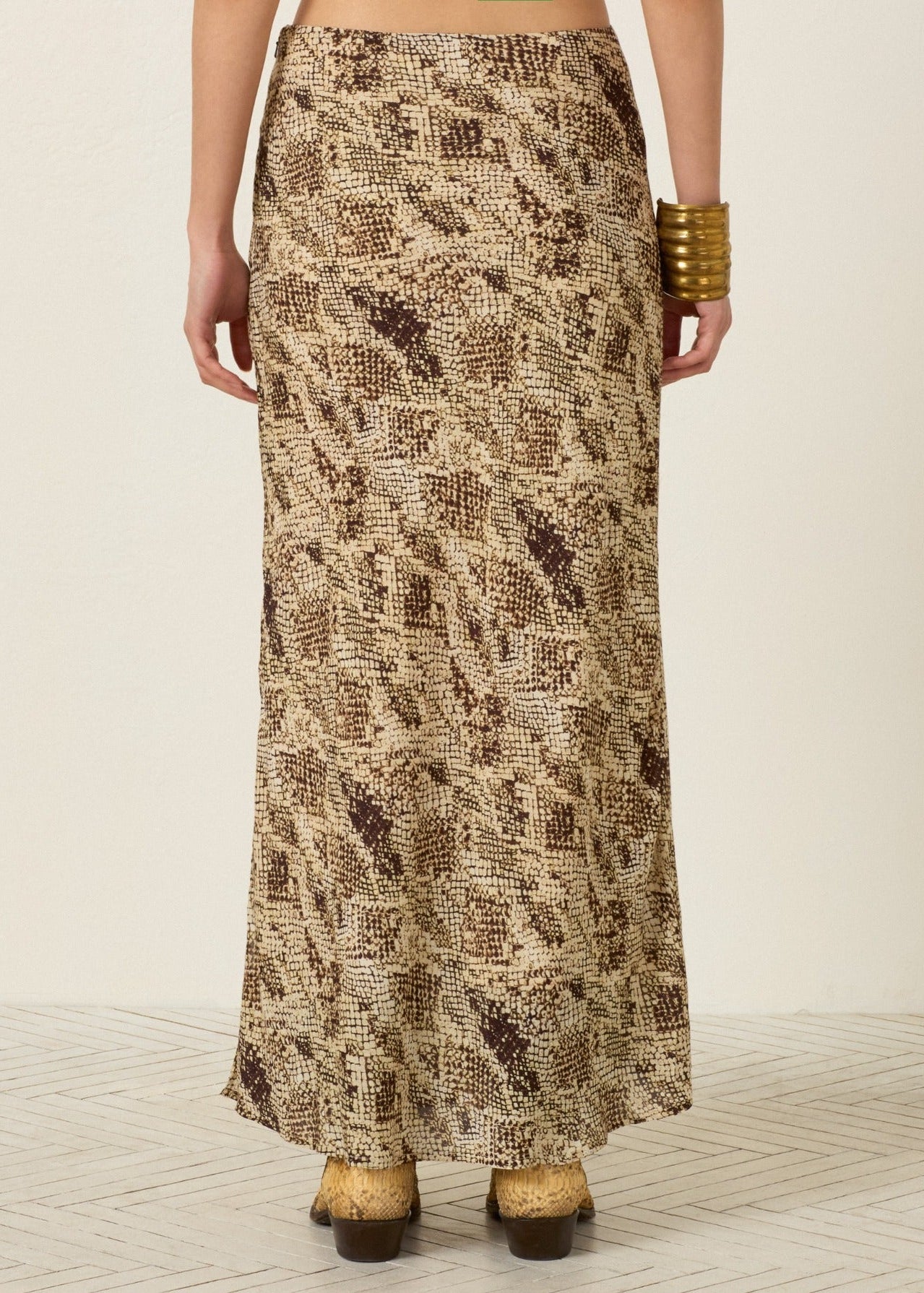 person wearing alix of bohemia Lyra Lemon Snakeskin Skirt