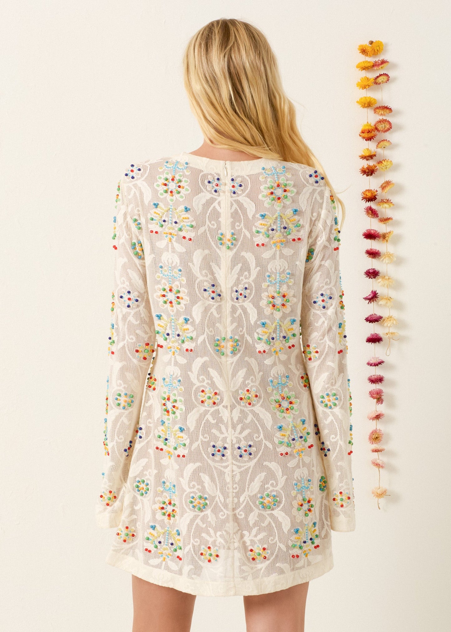 person wearing alix of bohemia Narene Pearl Sprig Lace Dress