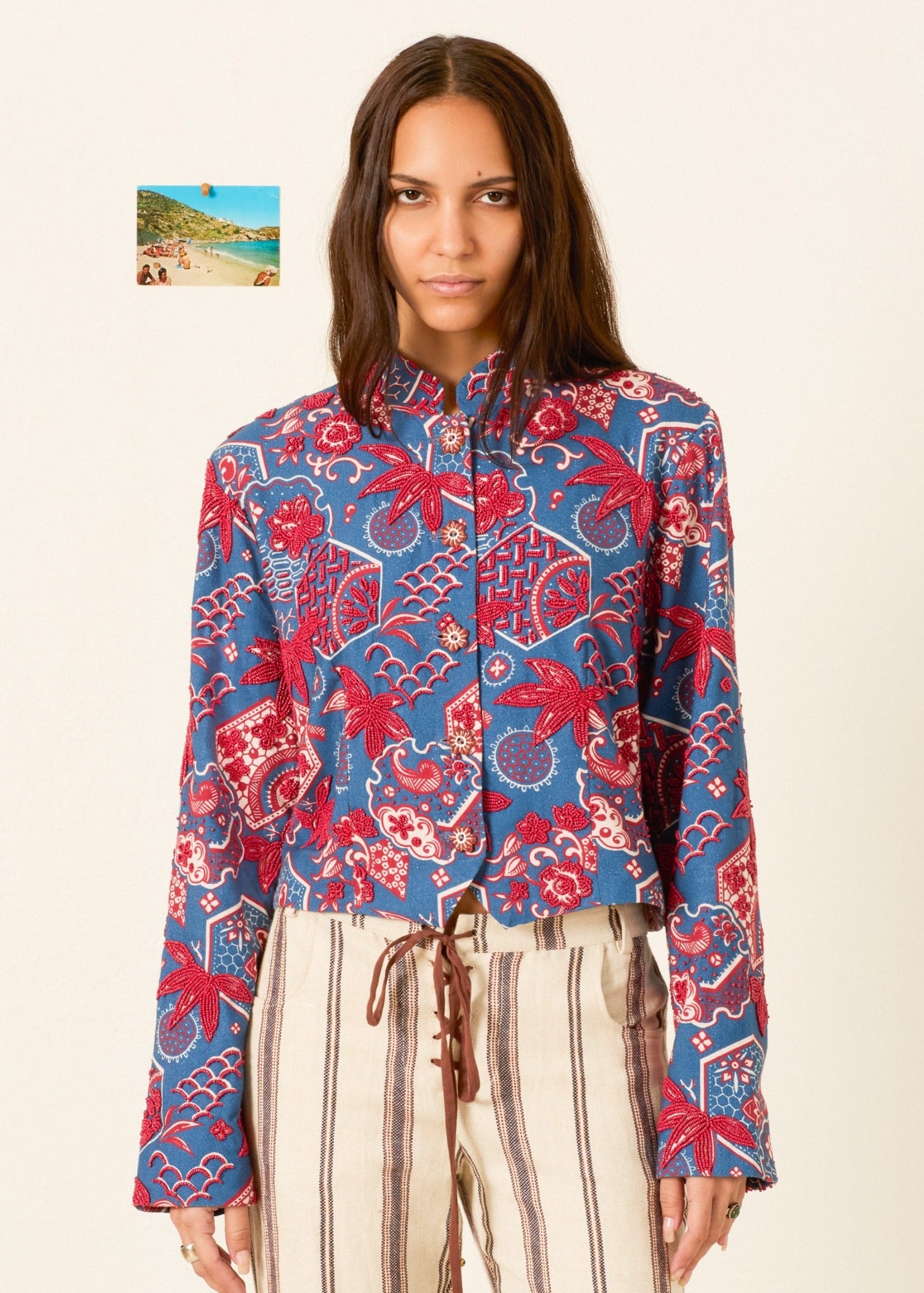 person wearing alix of bohemia blue printed Clarke Delft Hive Jacket