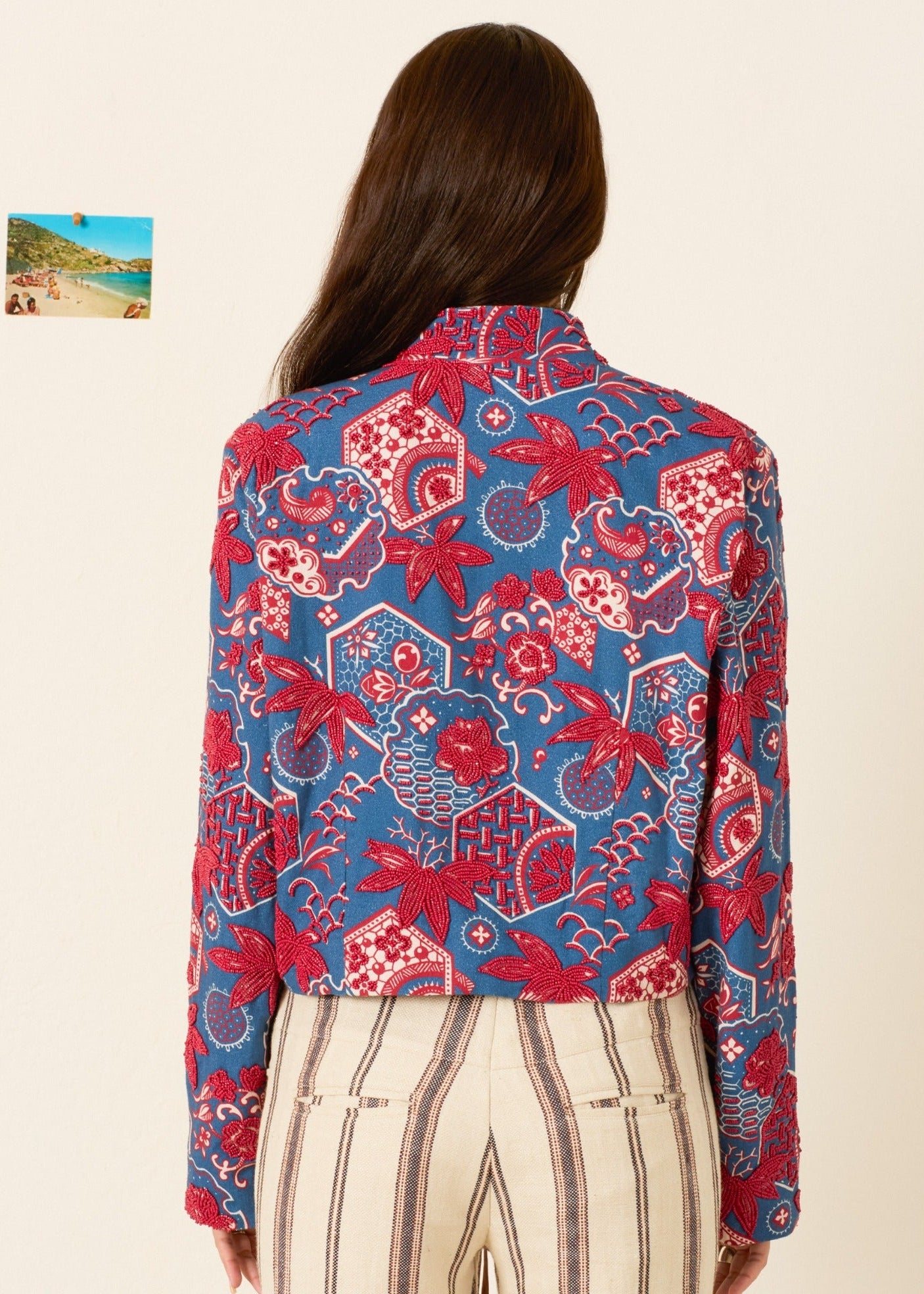 person wearing alix of bohemia blue printed Clarke Delft Hive Jacket