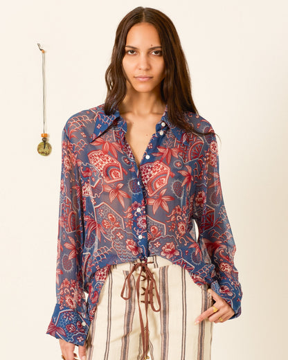 person wearing alix of bohemia printed blue Dana Delft Hive Shirt