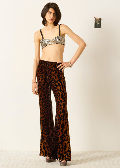 Person wearing alix of bohemia womens Farah Leopard Velvet Pant