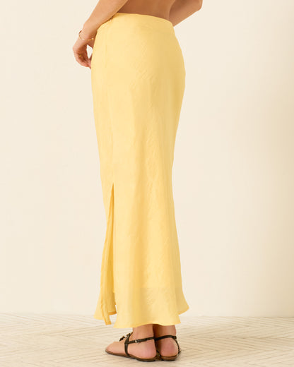 person wearing alix of bohemia womens Lyra Sunlight Silk Skirt yellow 