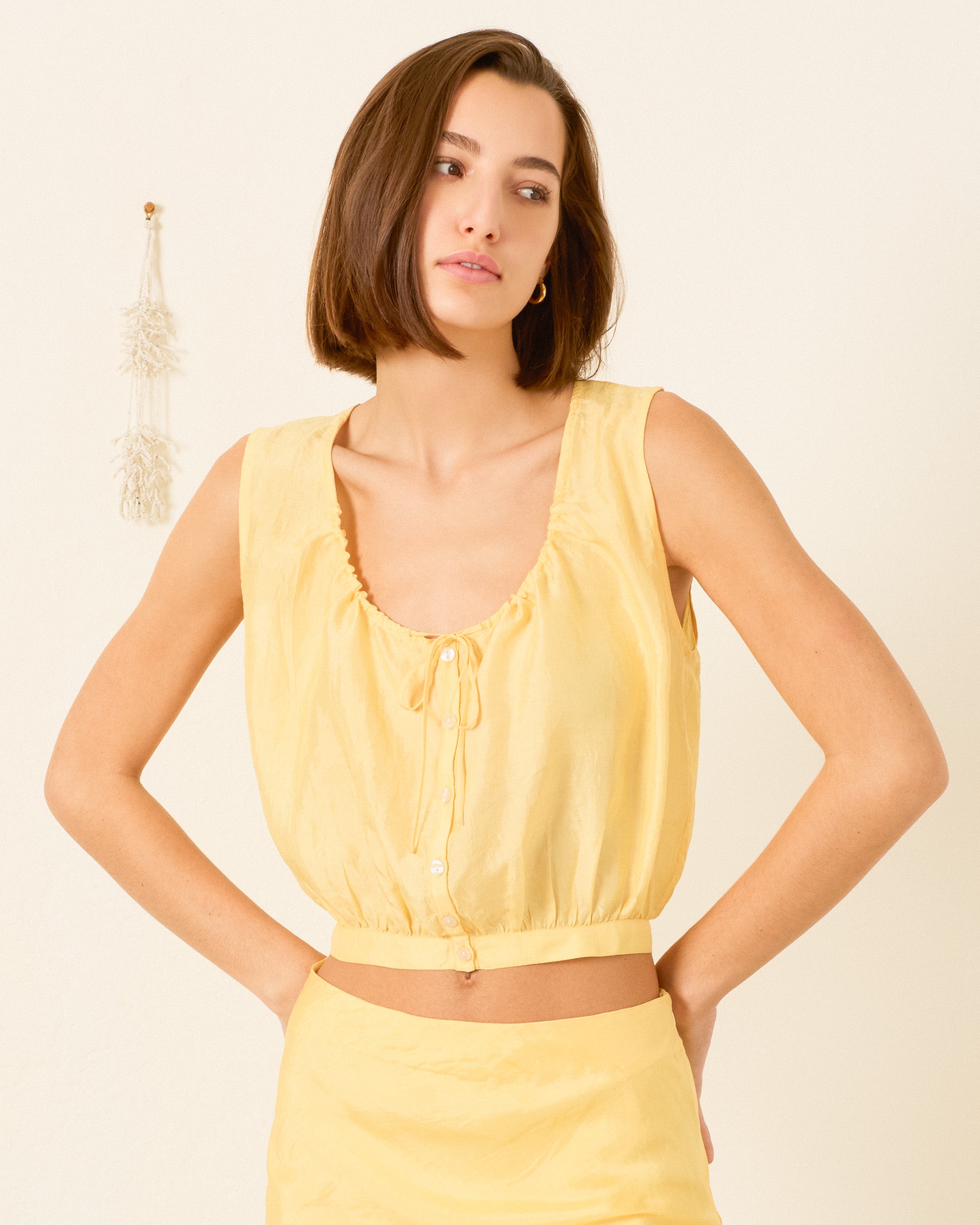 person wearing alix of bohemia womens Nova Sunlight Silk Shirt yellow