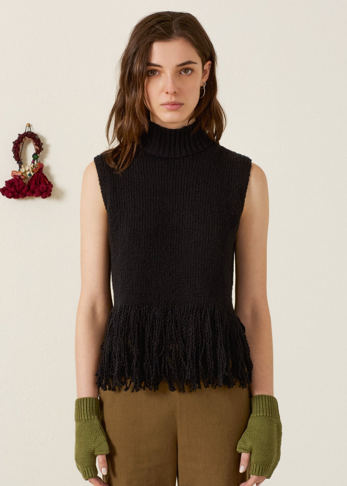 person wearing alix of bohemia womens Sonia Onyx Fringe Top in Black