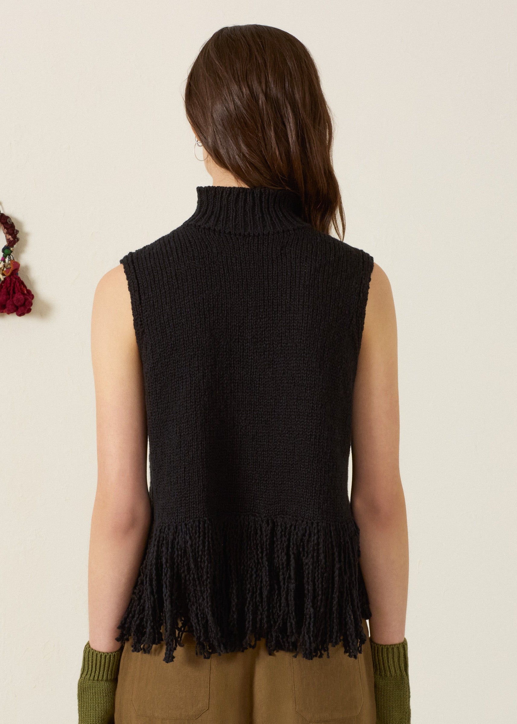 person wearing alix of bohemia womens Sonia Onyx Fringe Top in Black