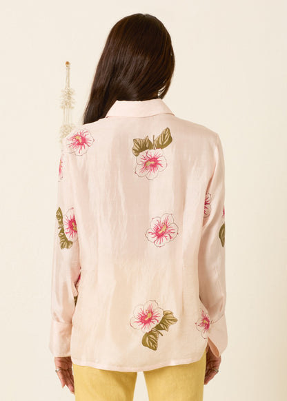 person wearing alix of bohemia womens printed Dana Blush Hibiscus Silk Shirt