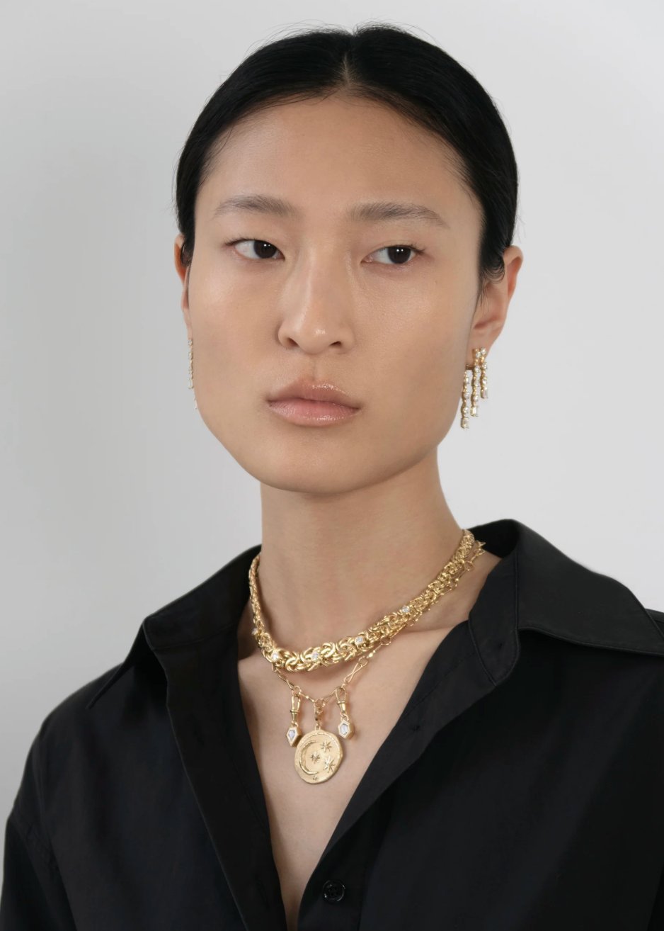 person wearing one of a kind azlee fine jewelry 18k yellow gold Le Nouveau .50ct Elongated Hexagon Diamond Charm necklace
