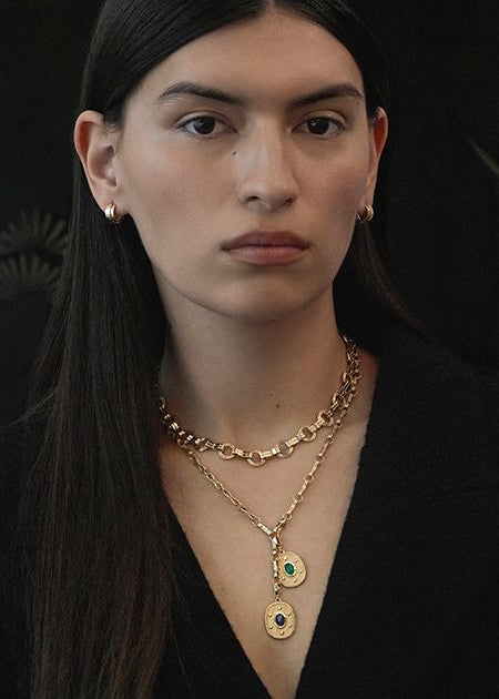 person wearing azlee fine jewelry 18k yellow gold diamond Regina Medium Sapphire Cabochon Coin pendant charm