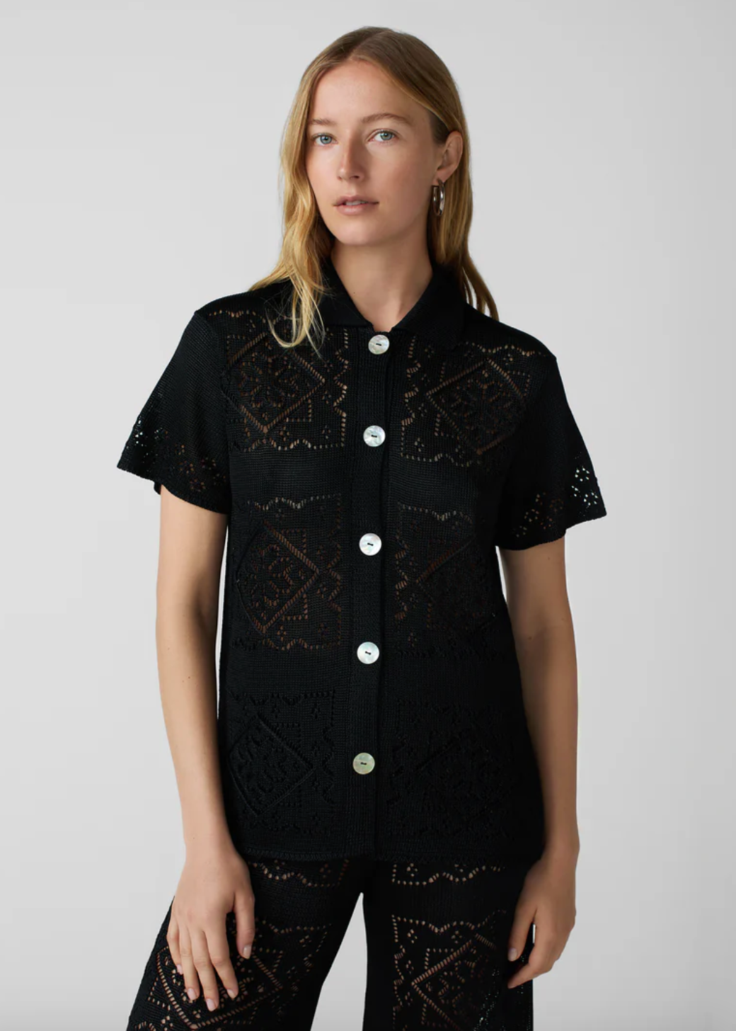 person wearing calle del mar viscose Handkerchief Short Sleeve Shirt In Black