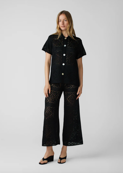 person wearing calle del mar viscose Handkerchief Short Sleeve Shirt and Pants In Black