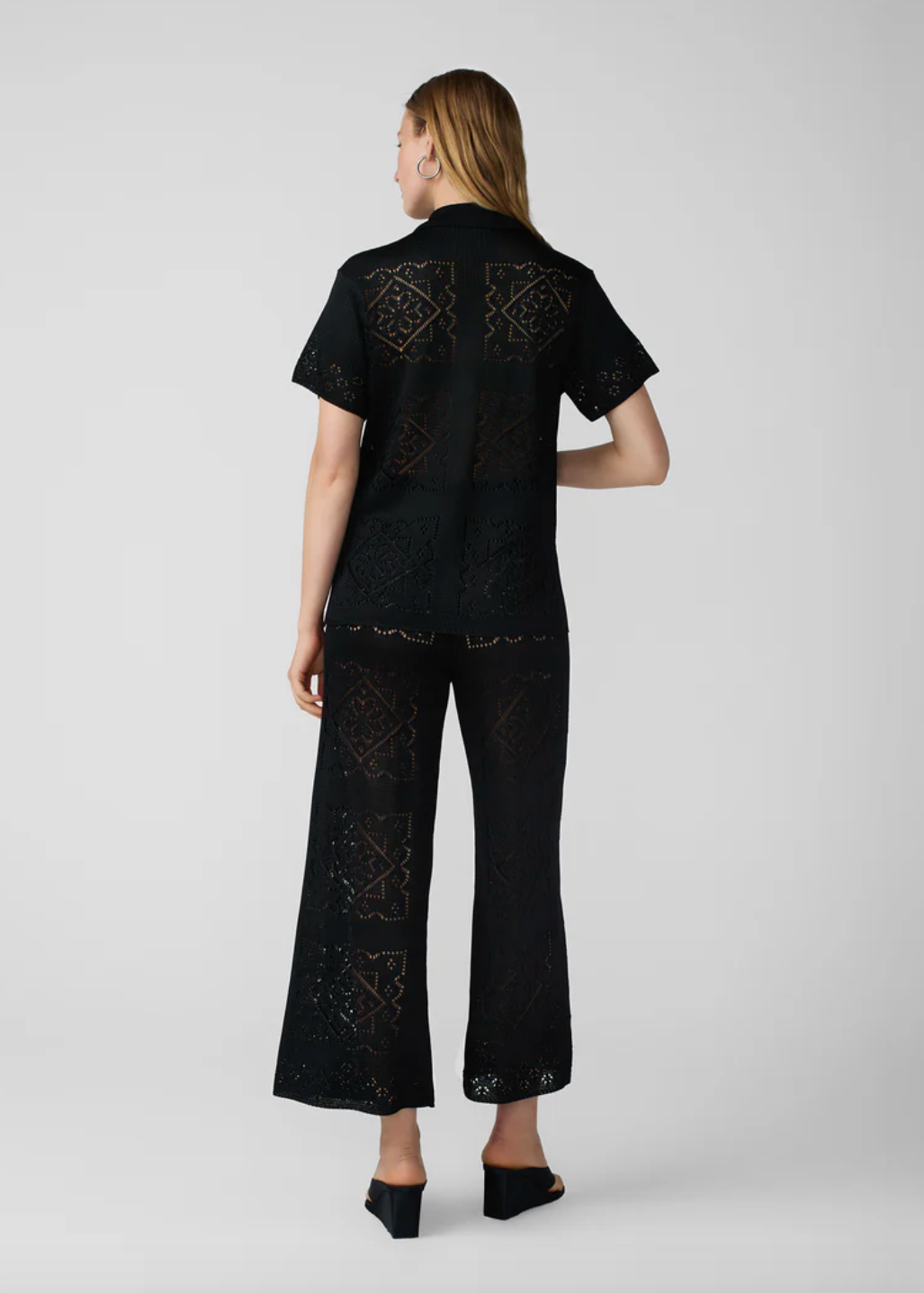 person wearing calle del mar viscose Handkerchief Short Sleeve Shirt and Pants In Black