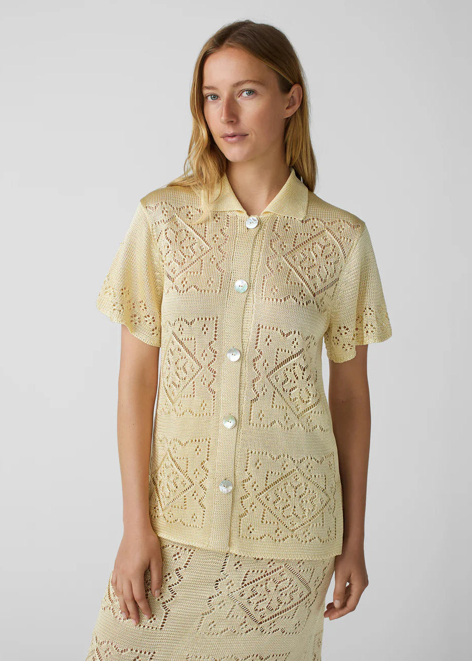 person wearing calle del mar womens viscose Handkerchief Short Sleeve Shirt In Custard yellow