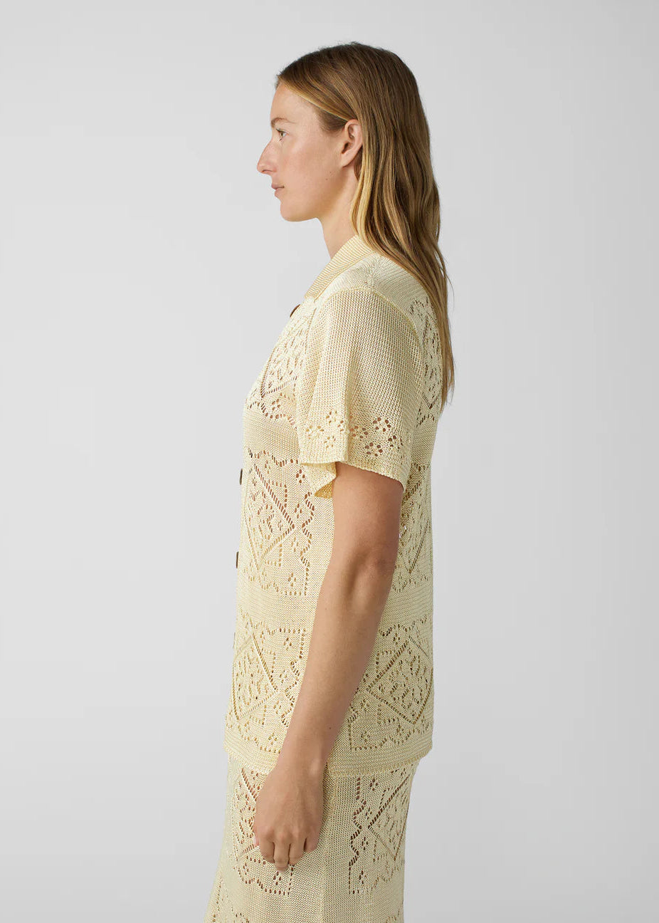 person wearing calle del mar womens viscose Handkerchief Short Sleeve Shirt In Custard yellow