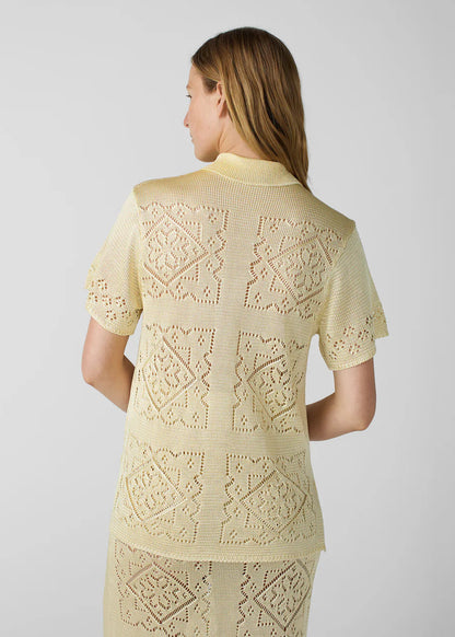person wearing calle del mar womens viscose Handkerchief Short Sleeve Shirt In Custard yellow