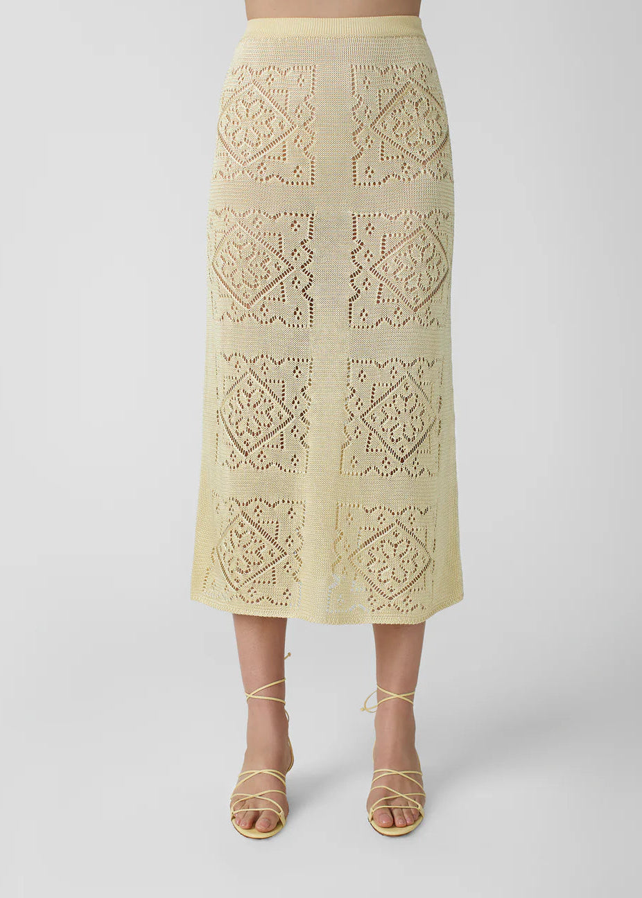 person wearing calle del mar womens viscose Handkerchief Skirt in Custard yellow