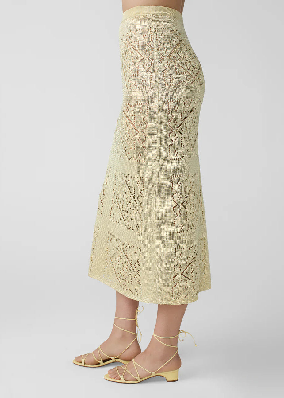 person wearing calle del mar womens viscose Handkerchief Skirt in Custard yellow
