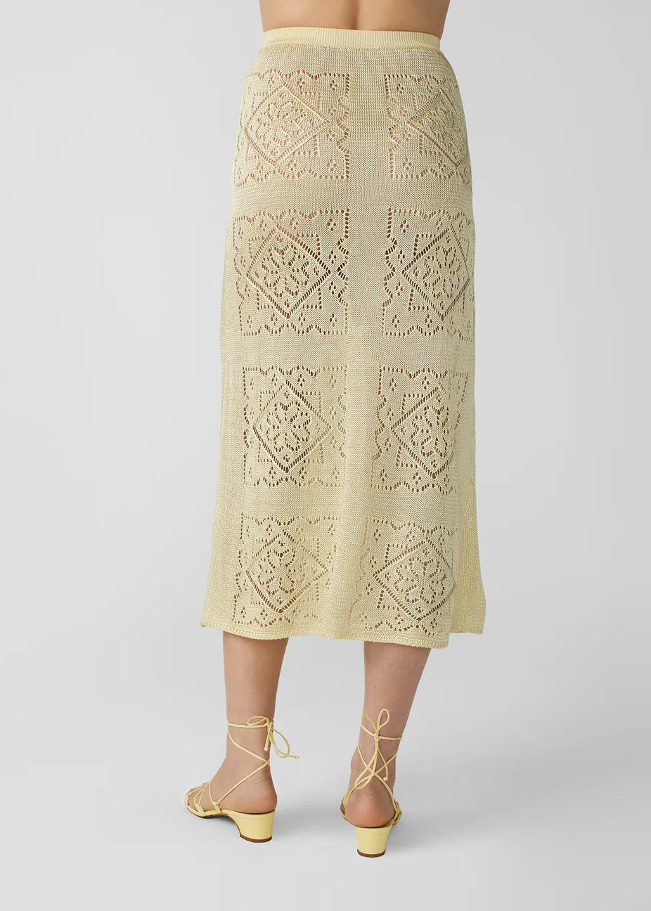 person wearing calle del mar womens viscose Handkerchief Skirt in Custard yellow