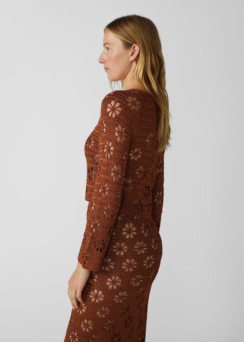 person wearing calle del mar womens viscose knit Floral Crochet Cardigan in Suede