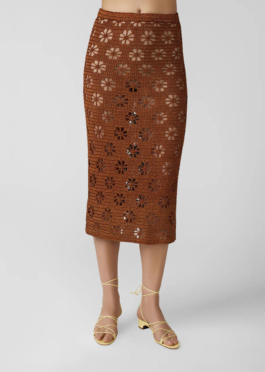 person wearing calle del mar womens viscose knit crochet Floral Crochet Skirt in Suede