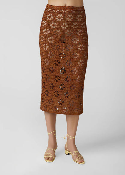 person wearing calle del mar womens viscose knit crochet Floral Crochet Skirt in Suede
