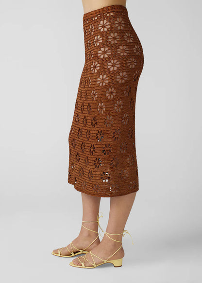 person wearing calle del mar womens viscose knit crochet Floral Crochet Skirt in Suede