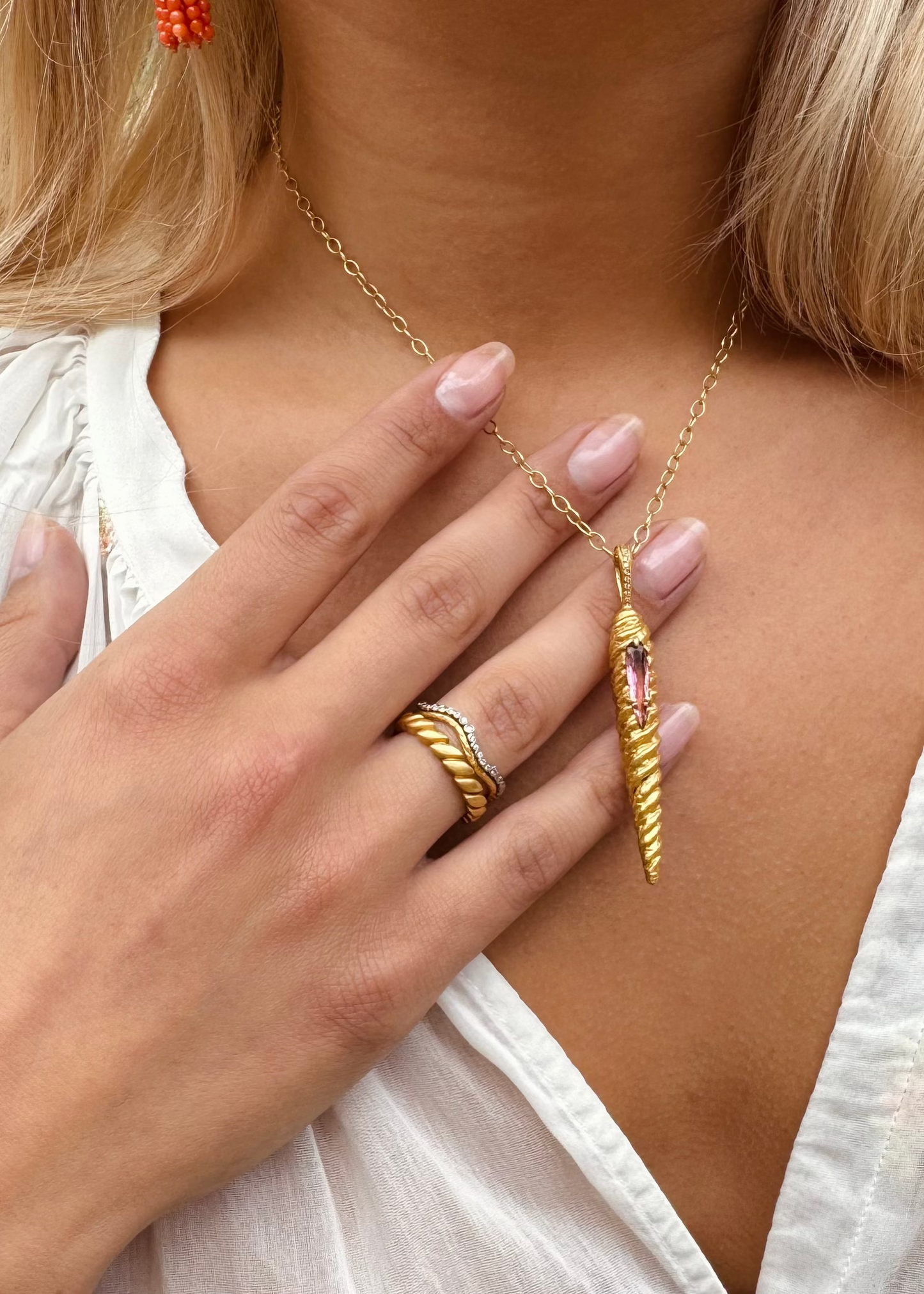 person wearing cathy waterman fine jewelry 22k yellow gold platinum diamond Branch & Scallop Band Single Row Laurel Band Magic Wand Charm with Pink Tourmaline