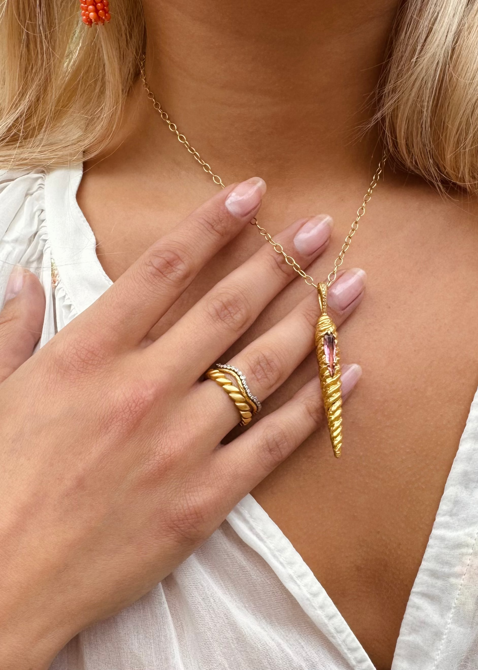 person wearing cathy waterman fine jewelry 22k yellow gold platinum diamond Branch & Scallop Band Single Row Laurel Band Magic Wand Charm with Pink Tourmaline