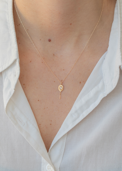person wearing celine daoust 14k yellow gold fine jewelry Diamond Heart Gold Plate Necklace