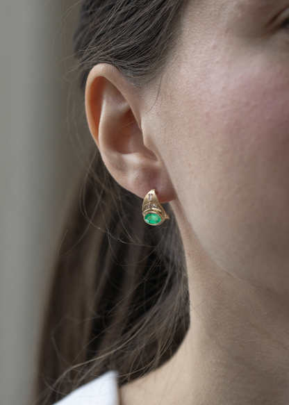 person wearing celine daoust fine jewelry 14k yellow gold Emerald & Diamonds Moon & Sun Earrings