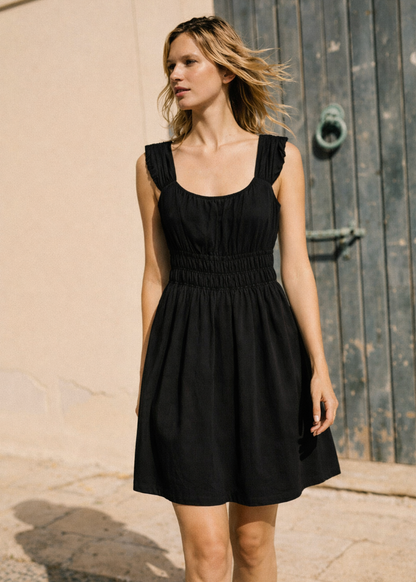 person wearing ciao lucia womens Abella Black Cotton Poplin Mini Dress