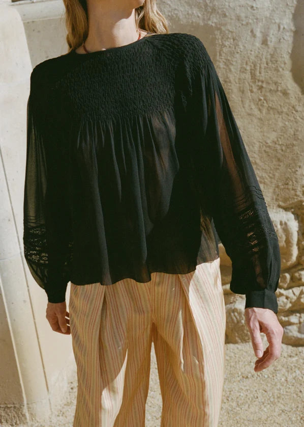 person wearing ciao lucia womens Alda Georgette Silk Top in Black