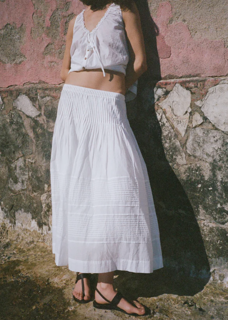 person wearing ciao lucia womens Enika Cotton Voile Skirt in White