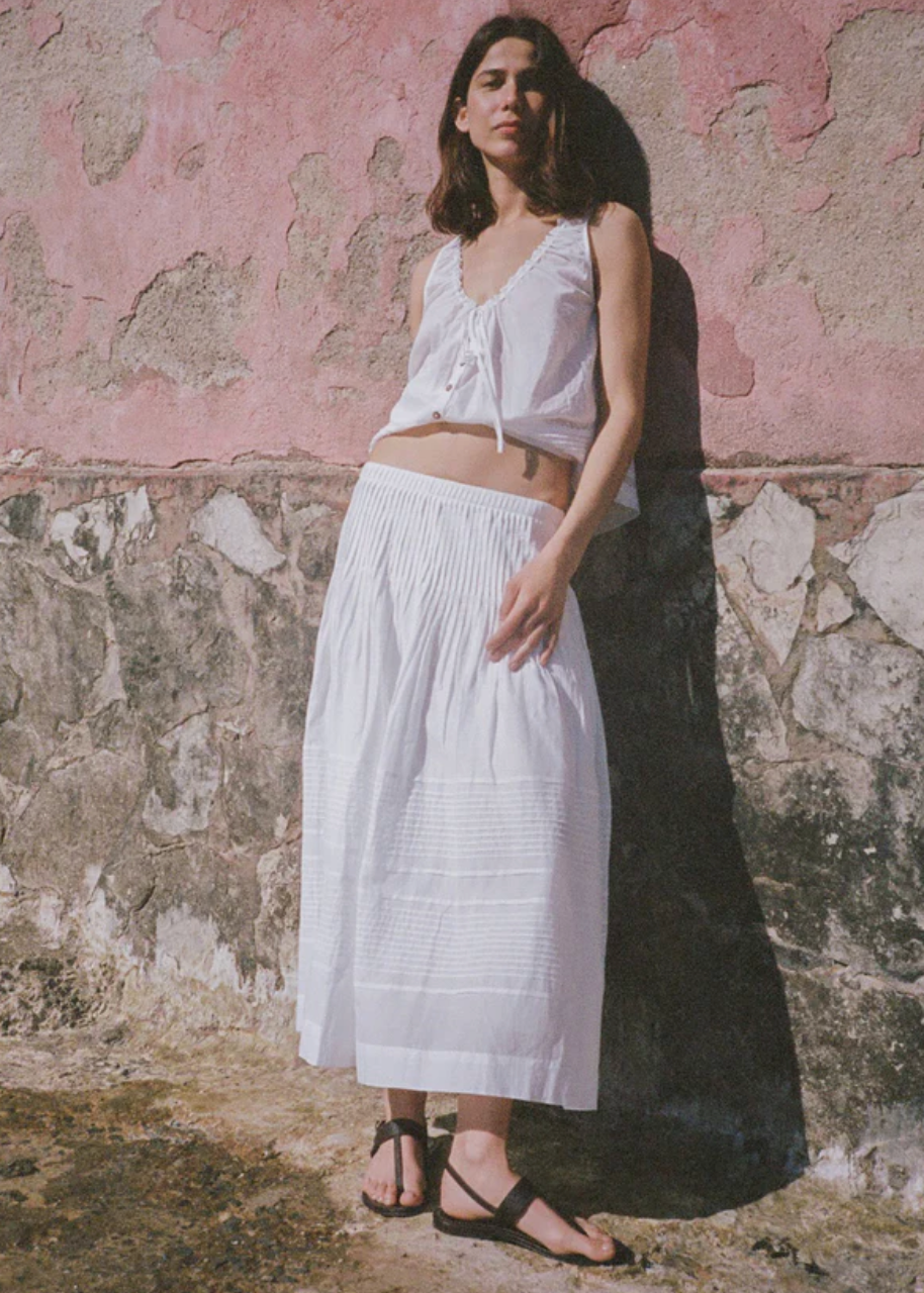 person wearing ciao lucia womens Enika Cotton Voile Skirt in White