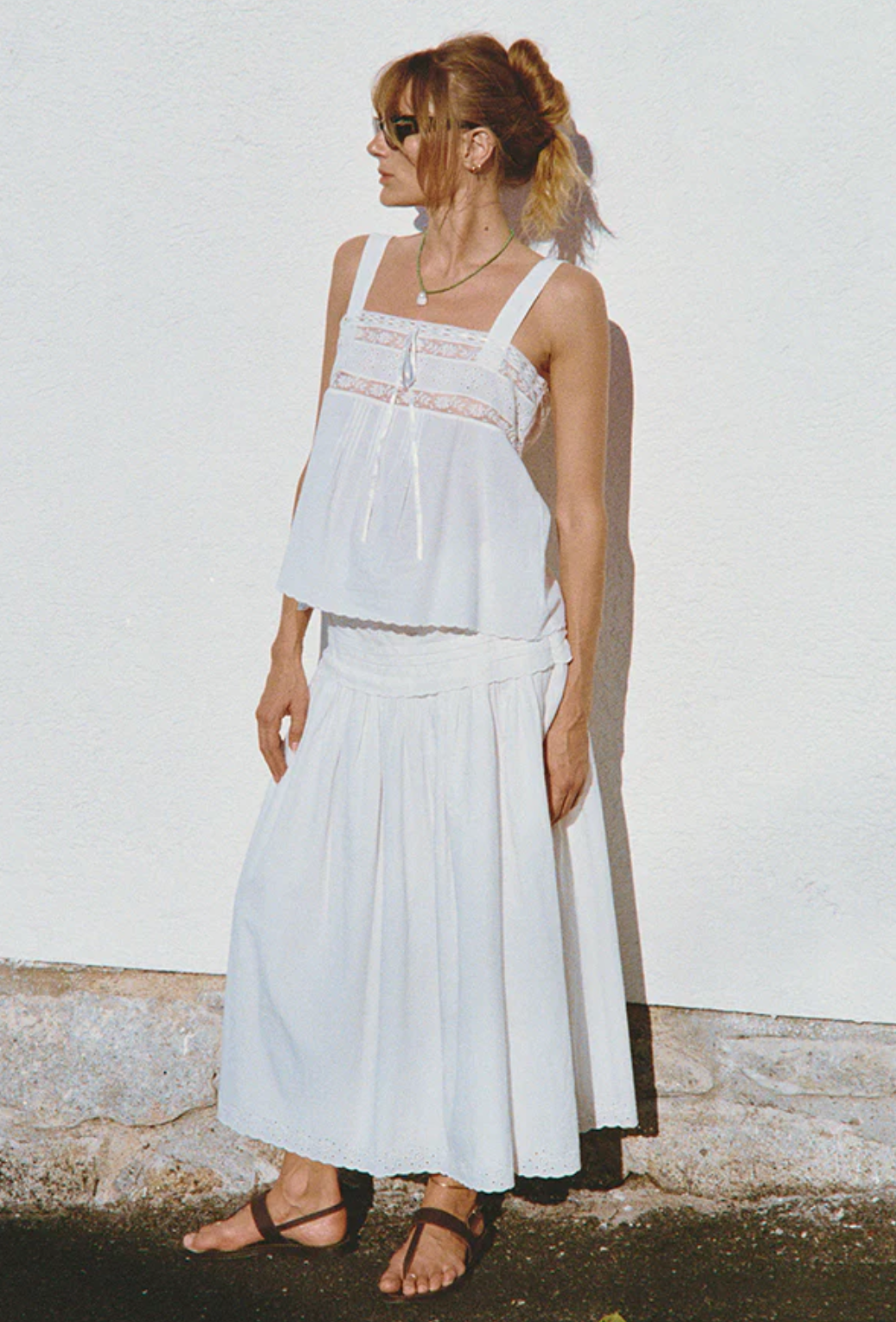 person wearing ciao lucia womens Irati White Embroidered Cotton Skirt