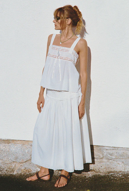 person wearing ciao lucia womens Irati White Embroidered Cotton Skirt