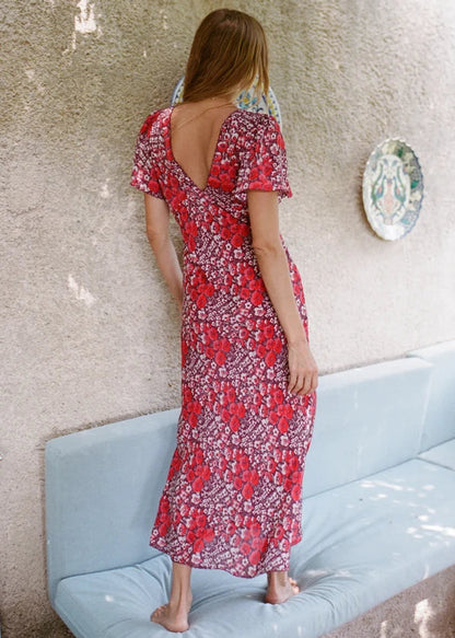 person wearing ciao lucia womens Lettie Poppy Silk Dress