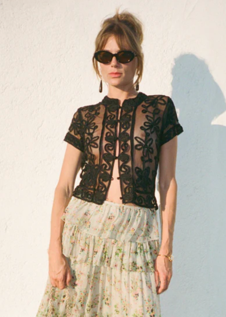 person wearing ciao lucia womens Nikola Soutache Top in Black